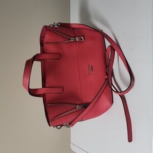 GUESS handbag/cross body bag in Coral  color